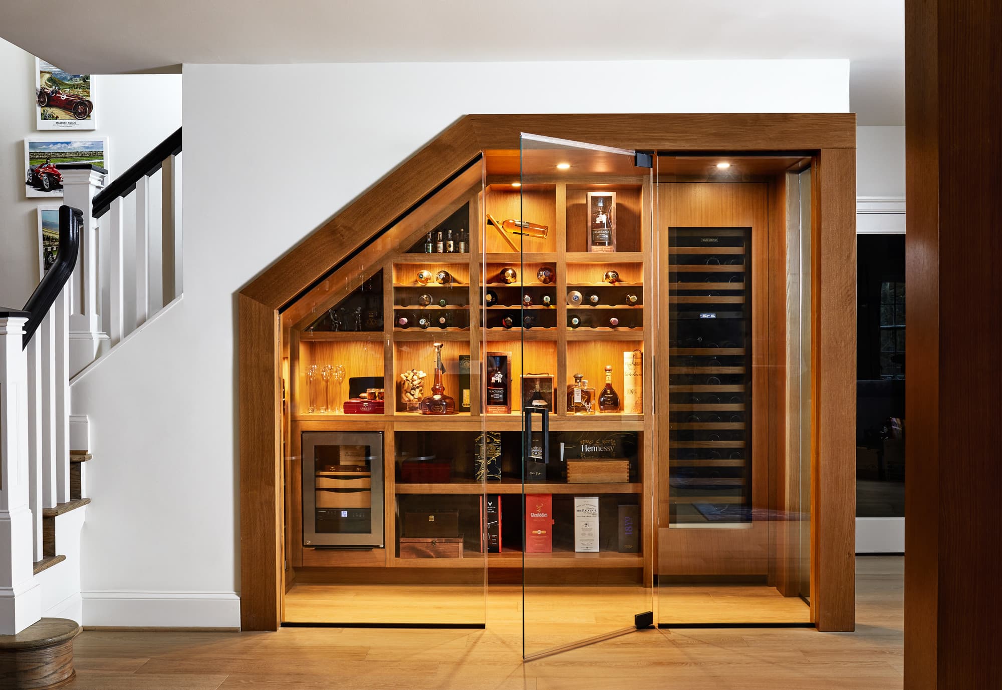 Smart under-stairs wine storage solution in historic Charlotte home maximizing space efficiency